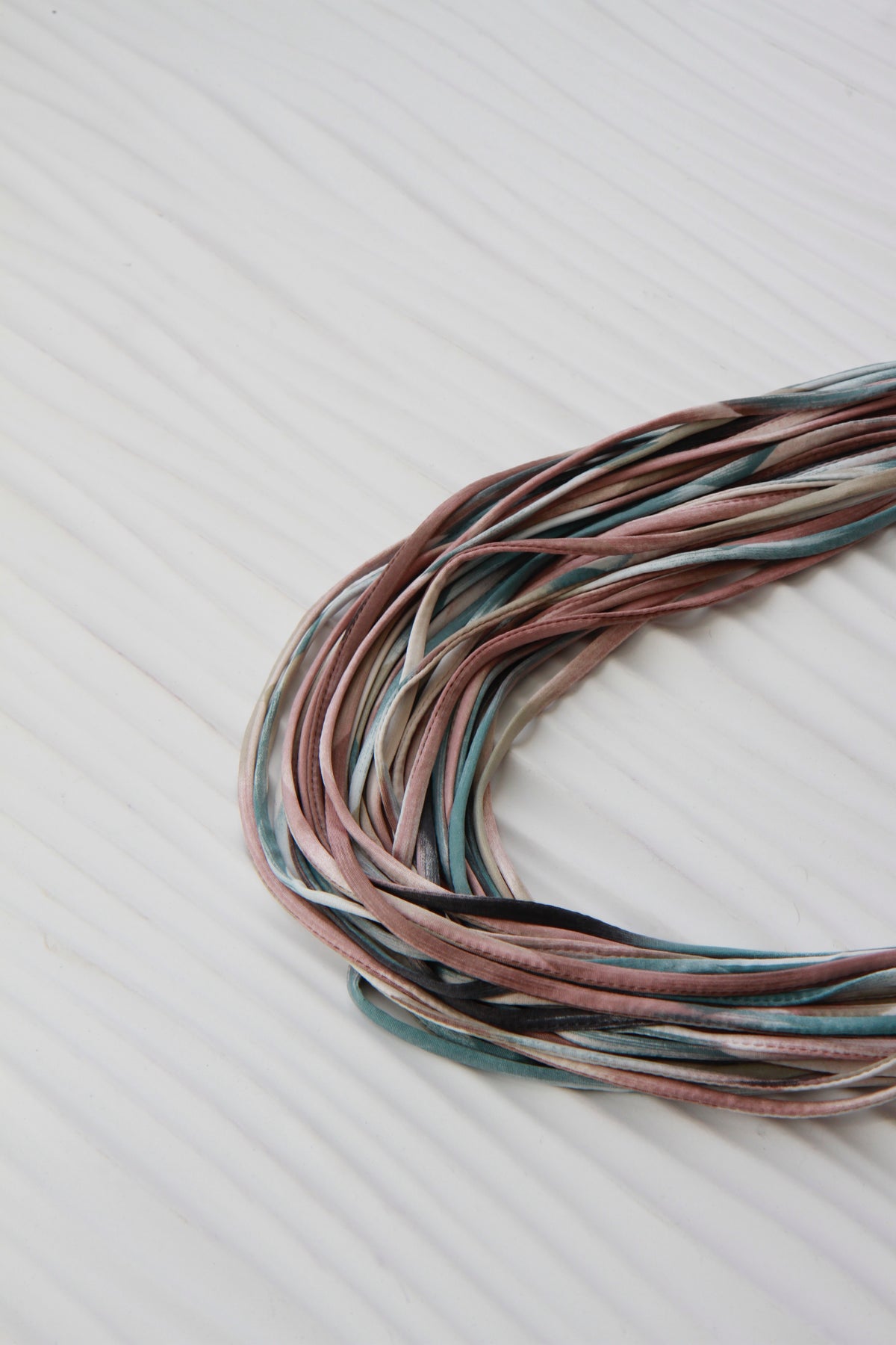 MAUVE INFINITY SCARF NECKLACE